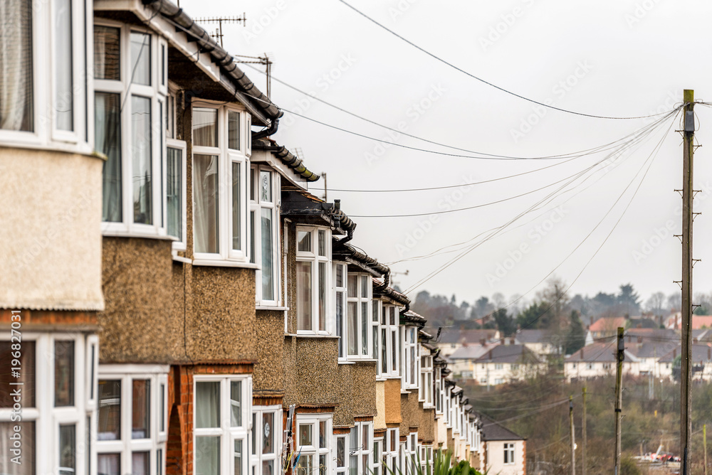 Typical row of houses in British city on cloudy day Typical row of houses in British city on cloudy day