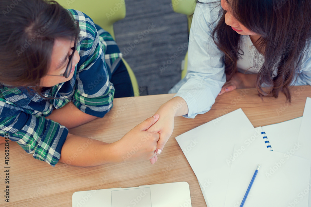 close up businesswoman handshake with partner colleague for success concept close up businesswoman handshake with partner colleague for success concept