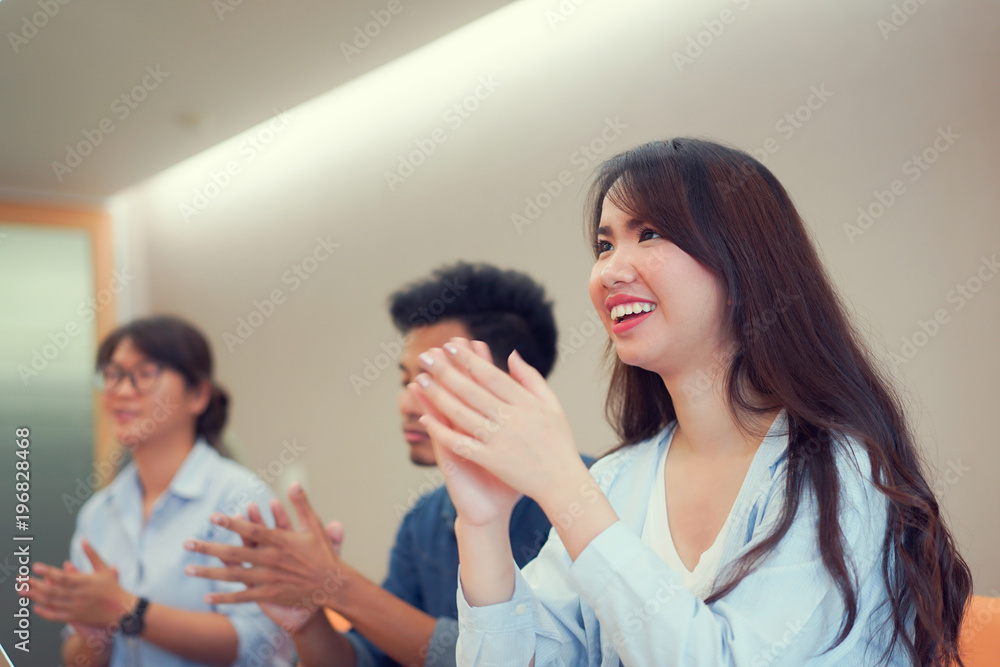 close up on asian businesswoman hand clapping with team for congratulation of success project on meeting room , business teamwork concept close up on asian businesswoman hand clapping with team for congratulation of success project on meeting room , business teamwork concept