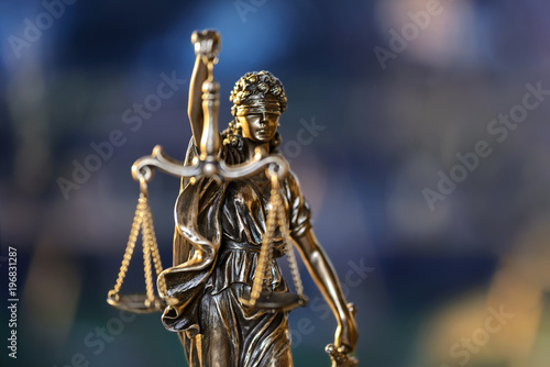 The Statue of Justice on defocused background. Selective focus © Vaceslav Romanov