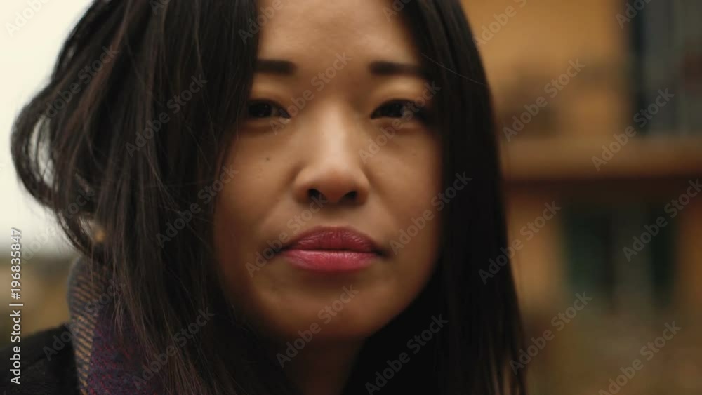 Sensual Beautiful asian woman staring at camera-outdoor-slow motion Sensual Beautiful asian woman staring at camera-outdoor-slow motion
