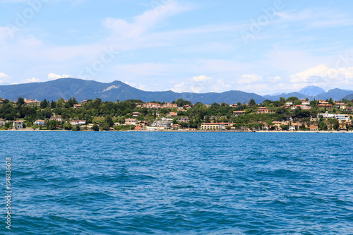Lake Garda and mountain panorama with coastline, Italy