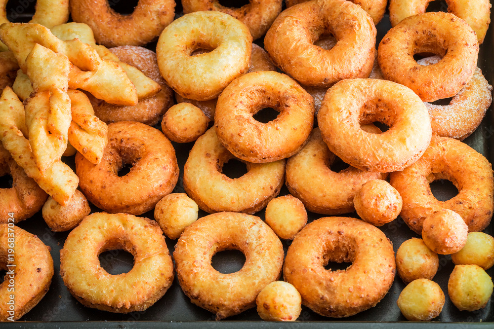 Closeup of homemade golden donuts freshly baked