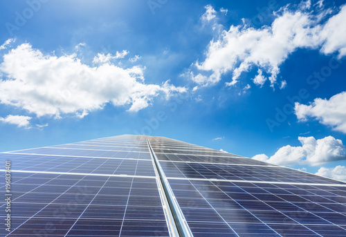 Solar panels and sky background green energy concept