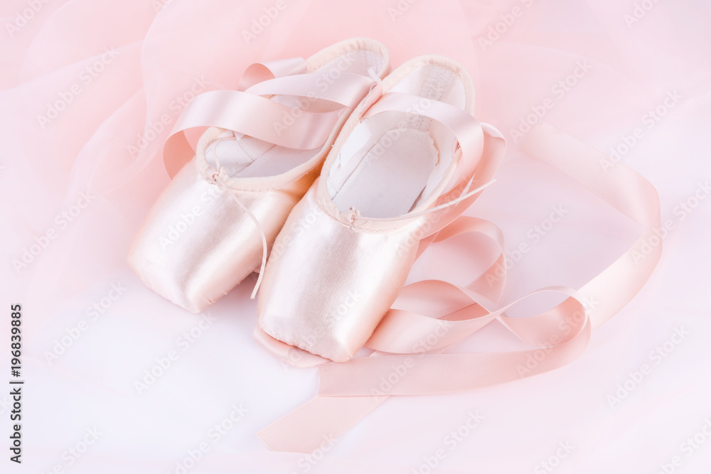Closeup of new ballet shoes and tutu Closeup of new ballet shoes and tutu