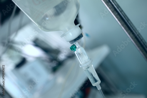 Iv dropper on the steel pole in the hospital ward