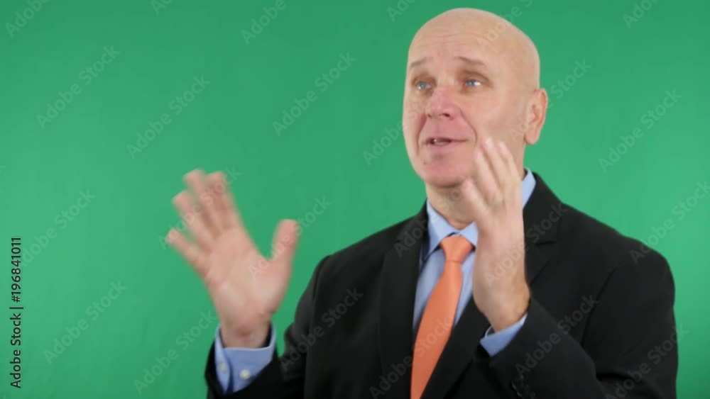 Businessperson in Interview Gesturing and Talking About Financial Issues Businessperson in Interview Gesturing and Talking About Financial Issues