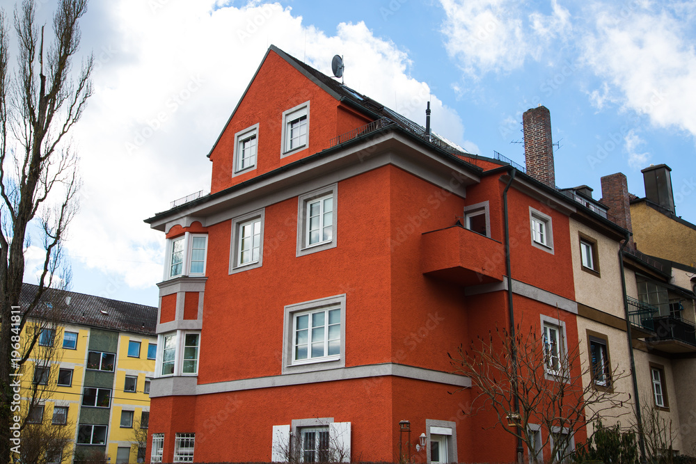 Fototapeta premium wine red multi-family house in Germany,