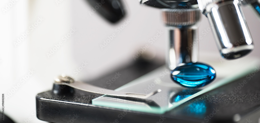 Laboratory Microscope. Scientific and healthcare research background.. drug tests tubes Laboratory Microscope. Scientific and healthcare research background.. drug tests tubes