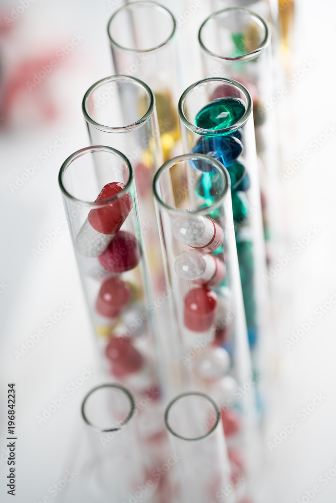 Laboratory Microscope. Scientific and healthcare research background.. drug tests tubes Laboratory Microscope. Scientific and healthcare research background.. drug tests tubes