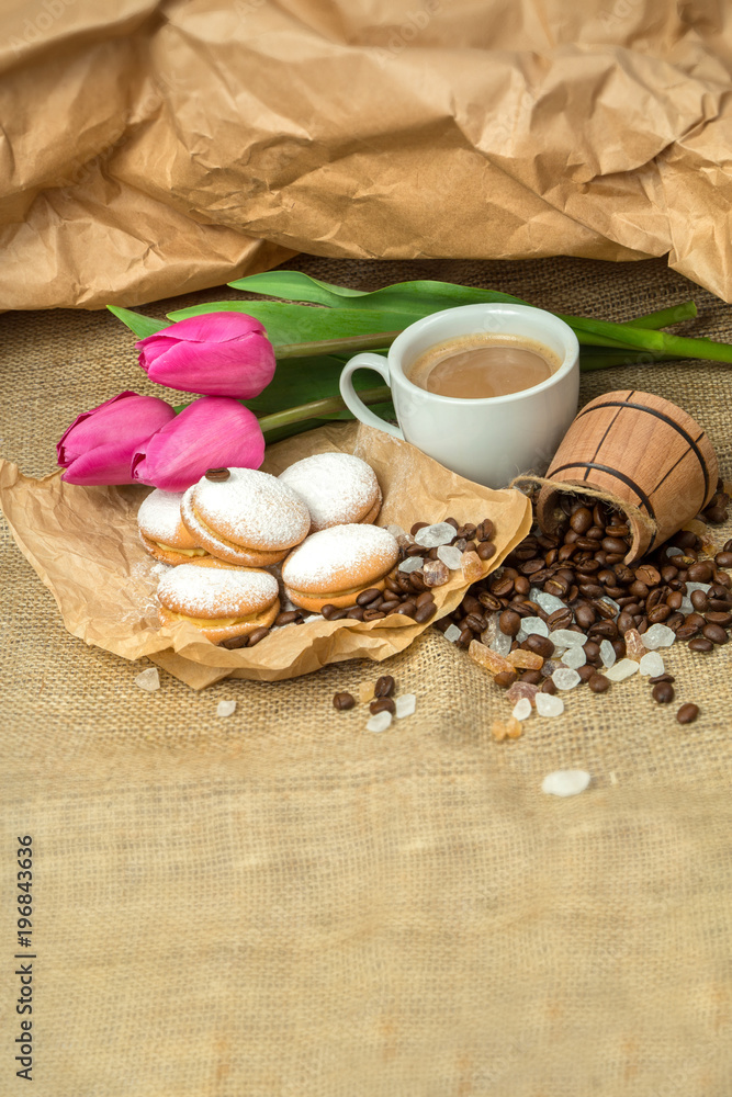 still life of coffee, biscuits, sugar on a rough background in brown tones still life of coffee, biscuits, sugar on a rough background in brown tones