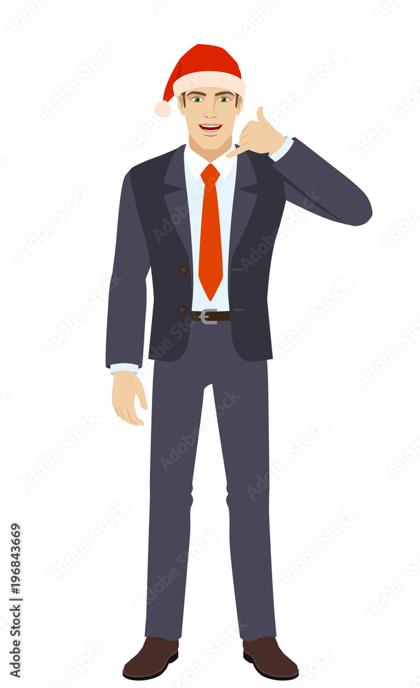 Call me! Businessman in Santa hat showing us a call me sign Call me! Businessman in Santa hat showing us a call me sign