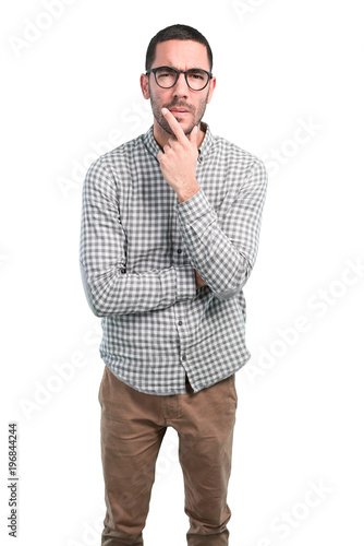 Suspicious young man posing