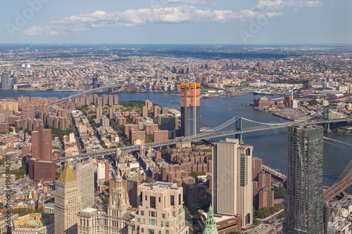 Aerial view of Manhattan skyline on a sunny summer day.