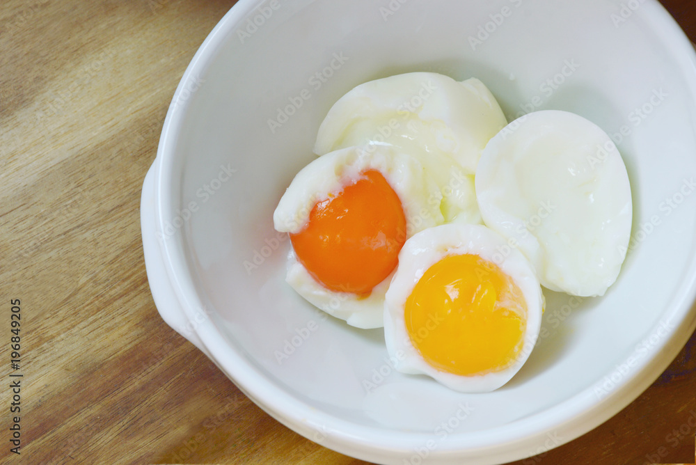 boiled eggs without shell in bowl boiled eggs without shell in bowl