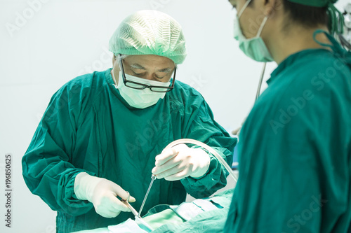 The surgery team working together at the operating room in the hospital.