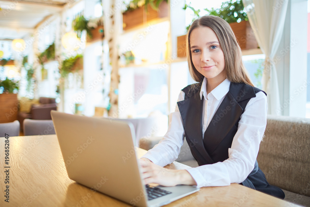 Portrait of businesswoman working her laptop computer Portrait of businesswoman working her laptop computer