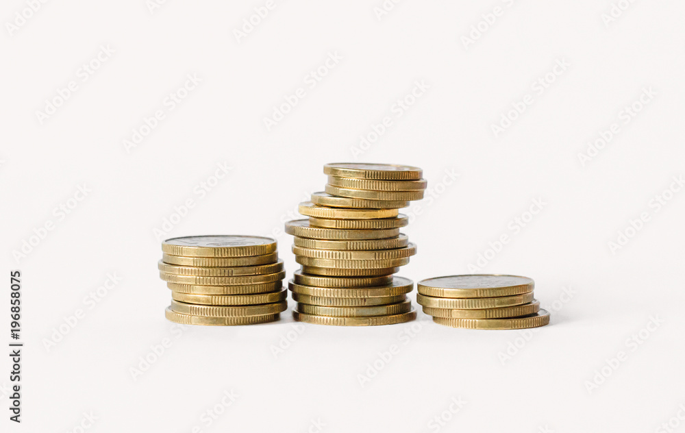 Rows of coins isolated on white background. Finance and banking concept. Rows of coins isolated on white background. Finance and banking concept.