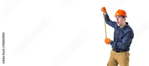 repairman (builder) holds the tape measure in his hand isolated on white background. Copy space