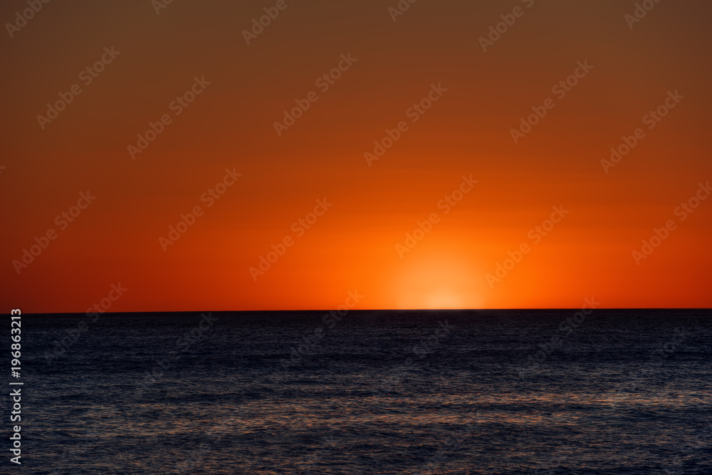Orange sunset above the sea