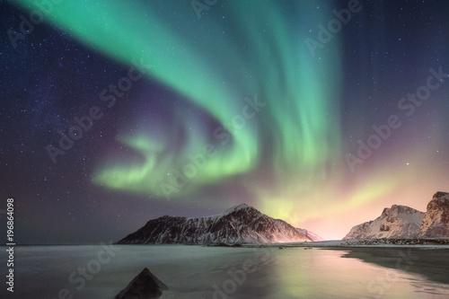 Northen light under mountains. Beautiful natural landscape in the Norway © Biletskiy Evgeniy