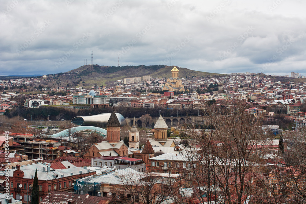 Fototapeta premium Panoramic view of Tbilisi, the capital of Georgia with old town and modern architecture