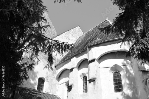 Fortified medieval saxon evangelic church in the village Somartin, Martinsberg, Märtelsberg, Transylvania, Romania. The settlement was founded by the Saxon colonists  photo