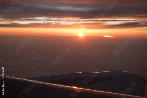 Fototapeta Naklejka Na Ścianę i Meble -  Beautiful sunset from airplain in the sky