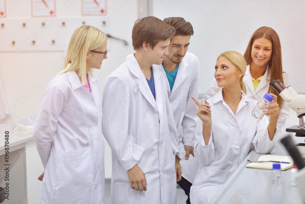 group of the students working at the laboratory group of the students working at the laboratory