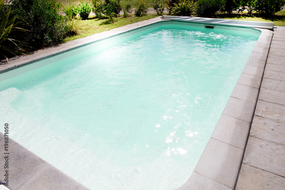 Swimming pool in summer garden