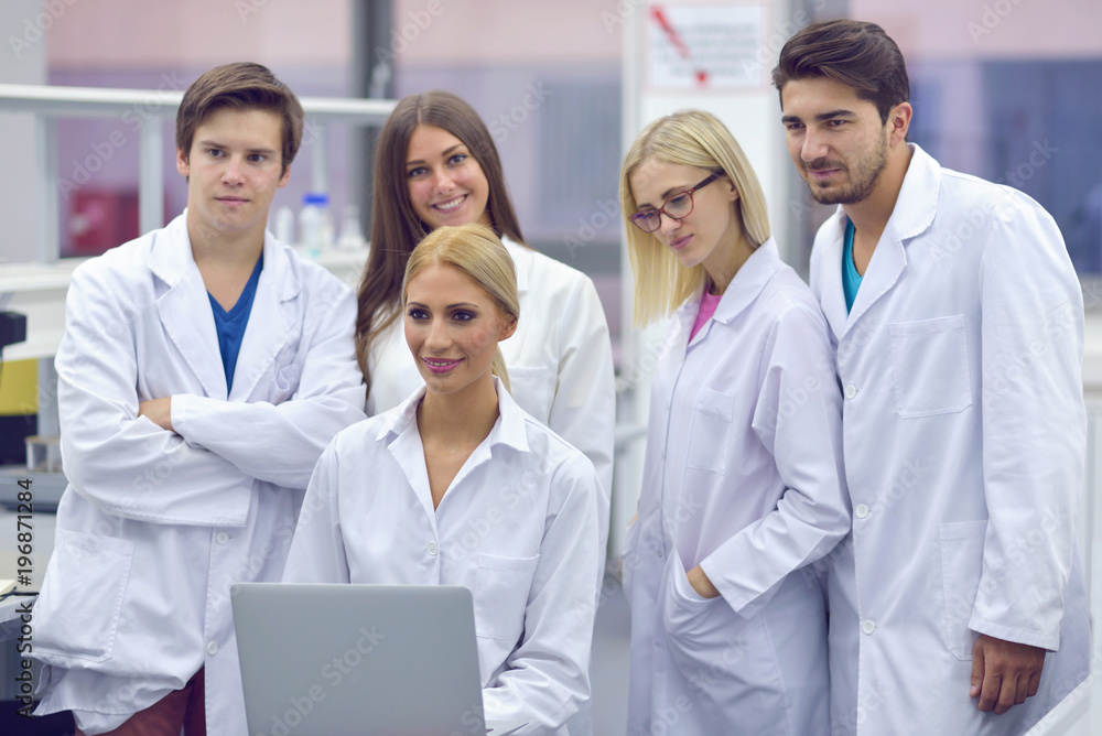 group of the students working at the laboratory group of the students working at the laboratory