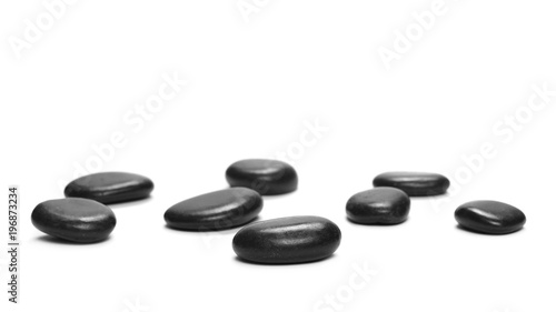 Pile black rocks isolated on white background, top view