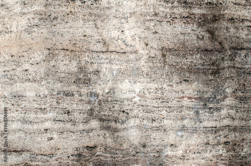 House wall decorative facing slab sandstone surface closeup as background House wall decorative facing slab sandstone surface closeup as background