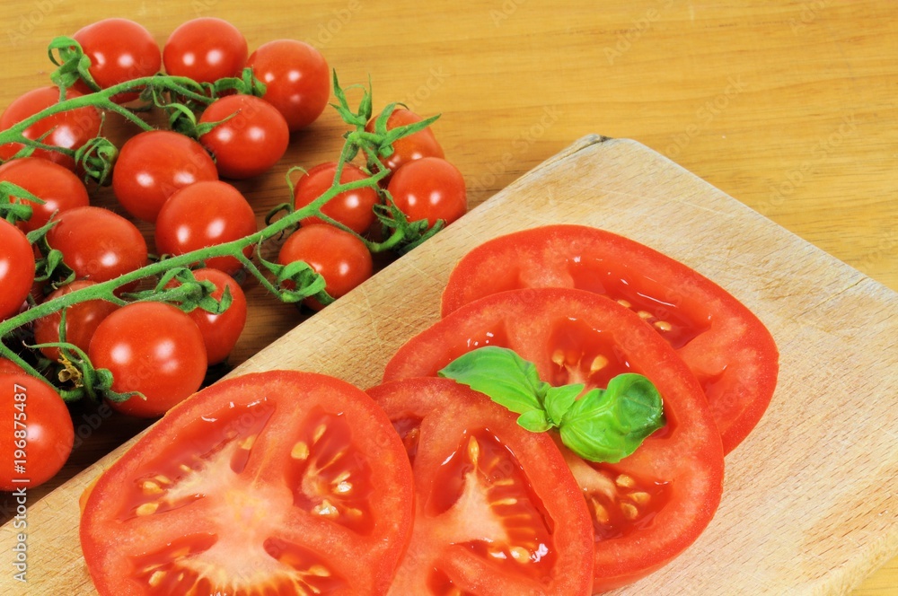 Group of traditional Italian tomatoes pachino on wooden background. Group of traditional Italian tomatoes pachino on wooden background.