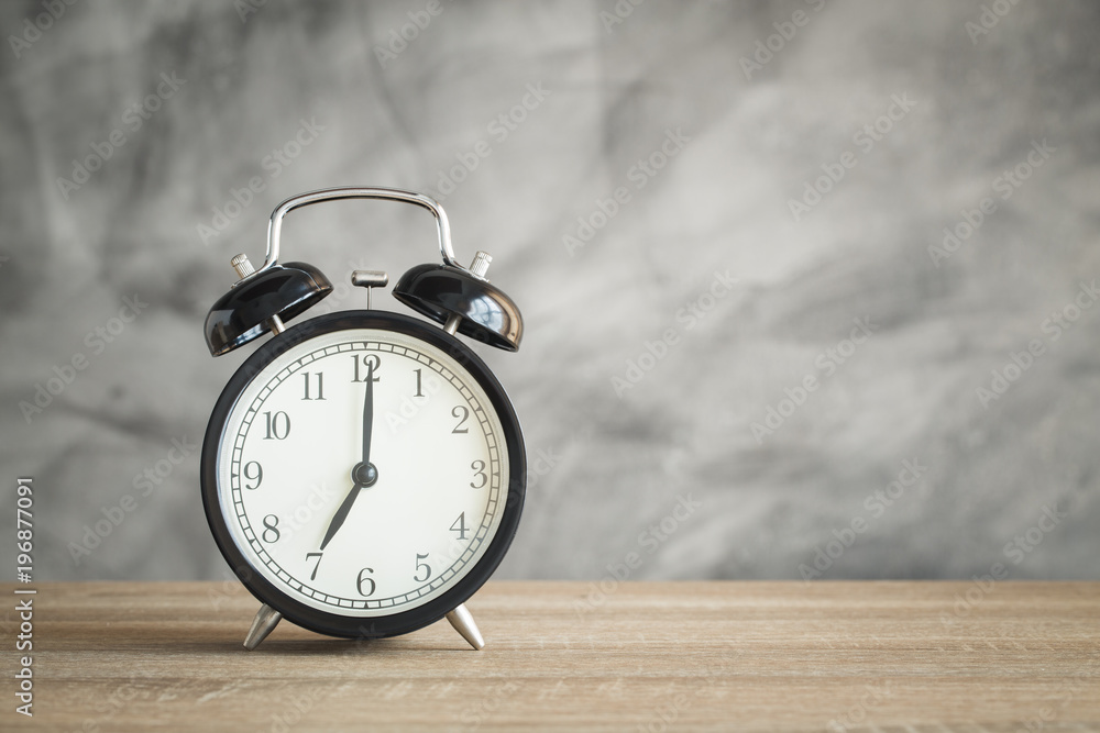 Alarm clock on wood table and copy space Alarm clock on wood table and copy space