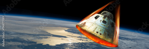 Reentry of space capsule into Earth's Atmosphere. - Elements of this image courtesy of NASA. photo