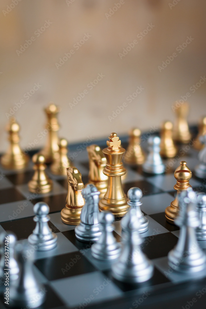 Silver and golden with enemy in game metaphor tactics and business plan concept Silver and golden with enemy in game metaphor tactics and business plan concept