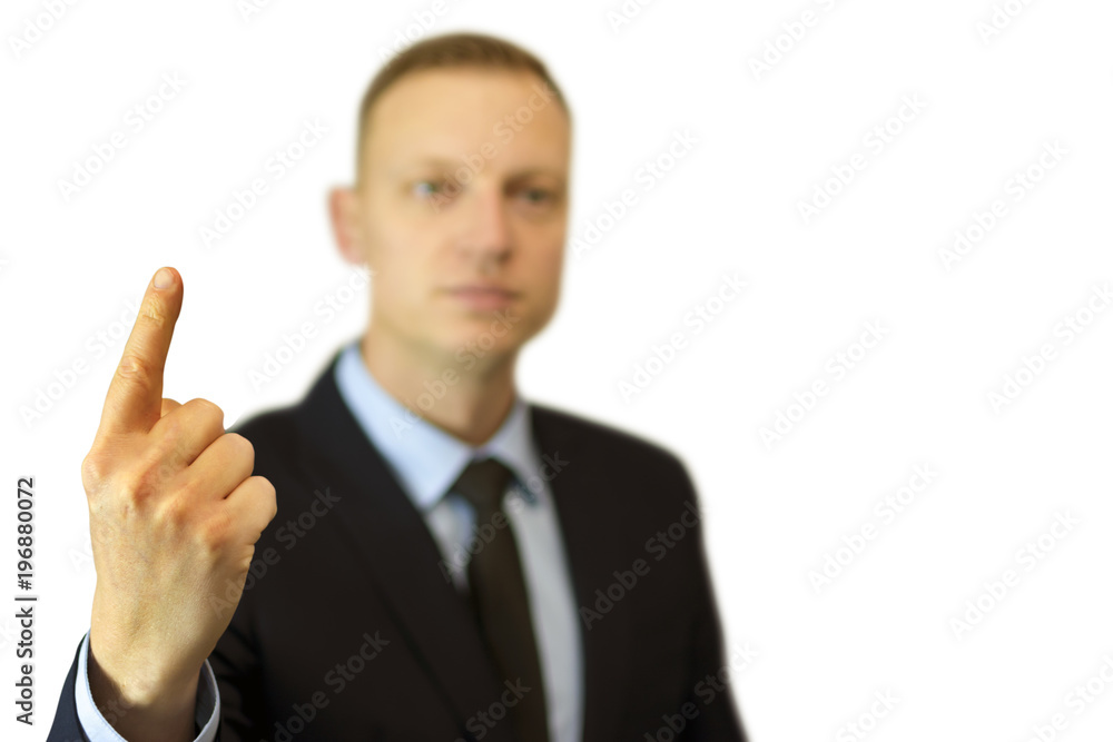 a young and handsome businessman pointing up with his finger a young and handsome businessman pointing up with his finger