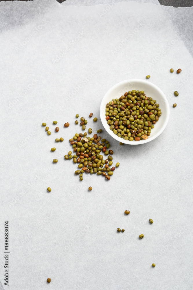Raw mung beans in bowl Raw mung beans in bowl