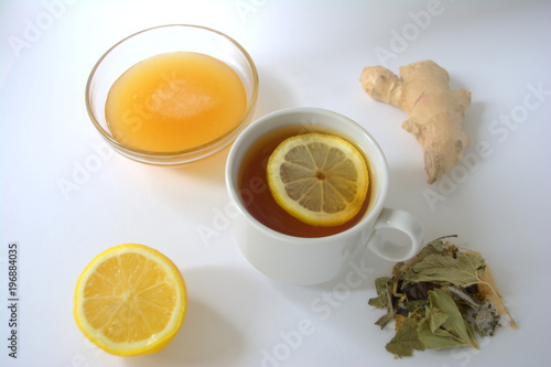 tea  lemon  honey and ginger on white background