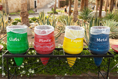 different colors bins for collect recycle materials