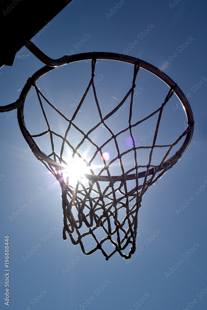 Basketball sun on blue sky background