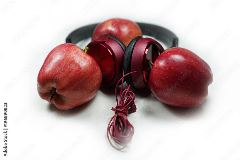 Red apples with red headphones on white-background (Music is food for the  soul) Stock Photo | Adobe Stock