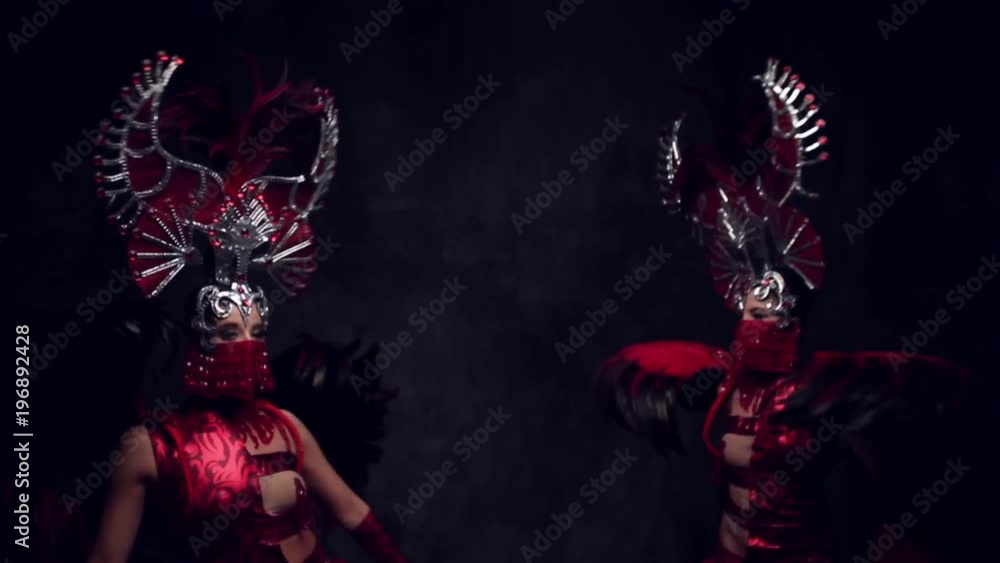 Beautiful women in crowns and carnival dresses Beautiful women in crowns and carnival dresses