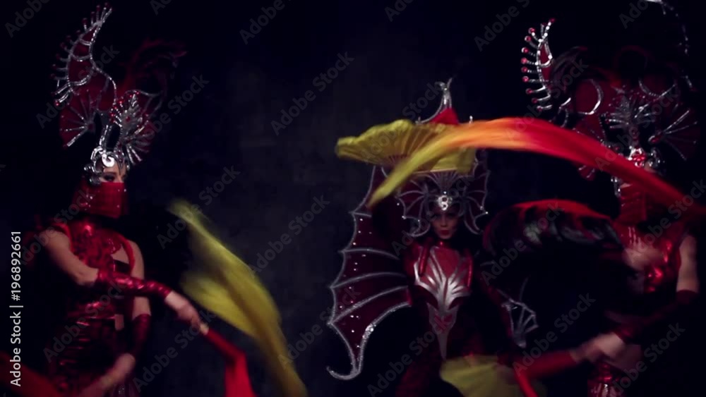 Beautiful women in crowns and carnival dresses Beautiful women in crowns and carnival dresses