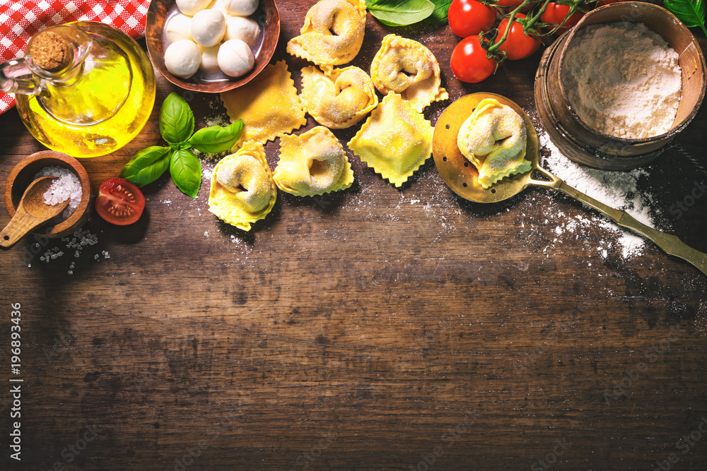 Top view on homemade pasta ravioli on old wooden table Top view on homemade pasta ravioli on old wooden table