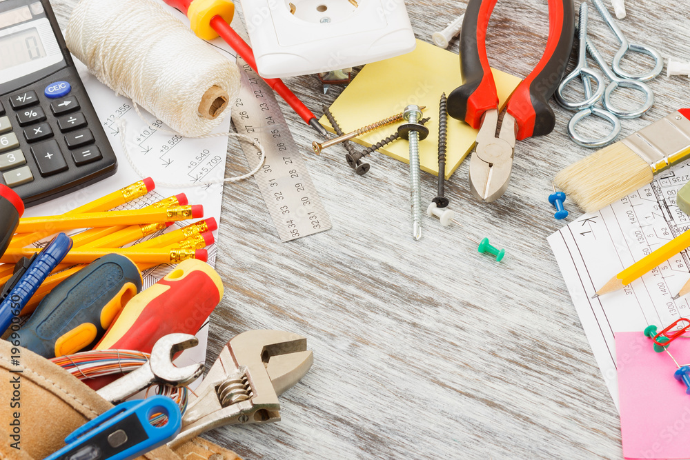 Different construction tools, wooden background Different construction tools, wooden background