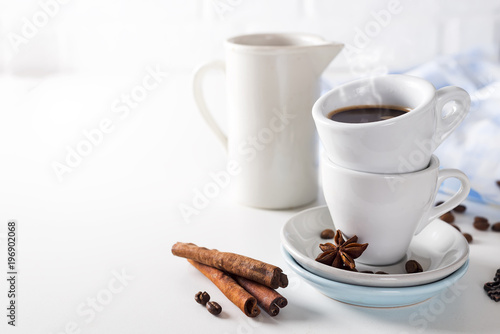 Coffee cup and beans on a white background.