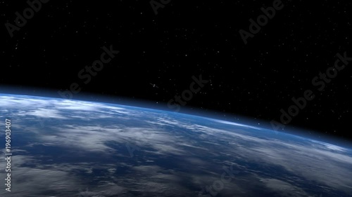 The satellite quickly approaches and flies to the right. The satellite scan and monitor the Earth. The earth rotates slowly. 4K. photo