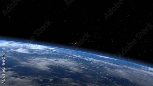 Two satellites quickly approaches and flies to the right. The satellite scan and monitor the Earth. The earth rotates slowly. 4K. photo